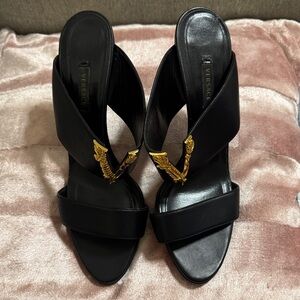 Versace Black Sandals with Gold Wing Detail
